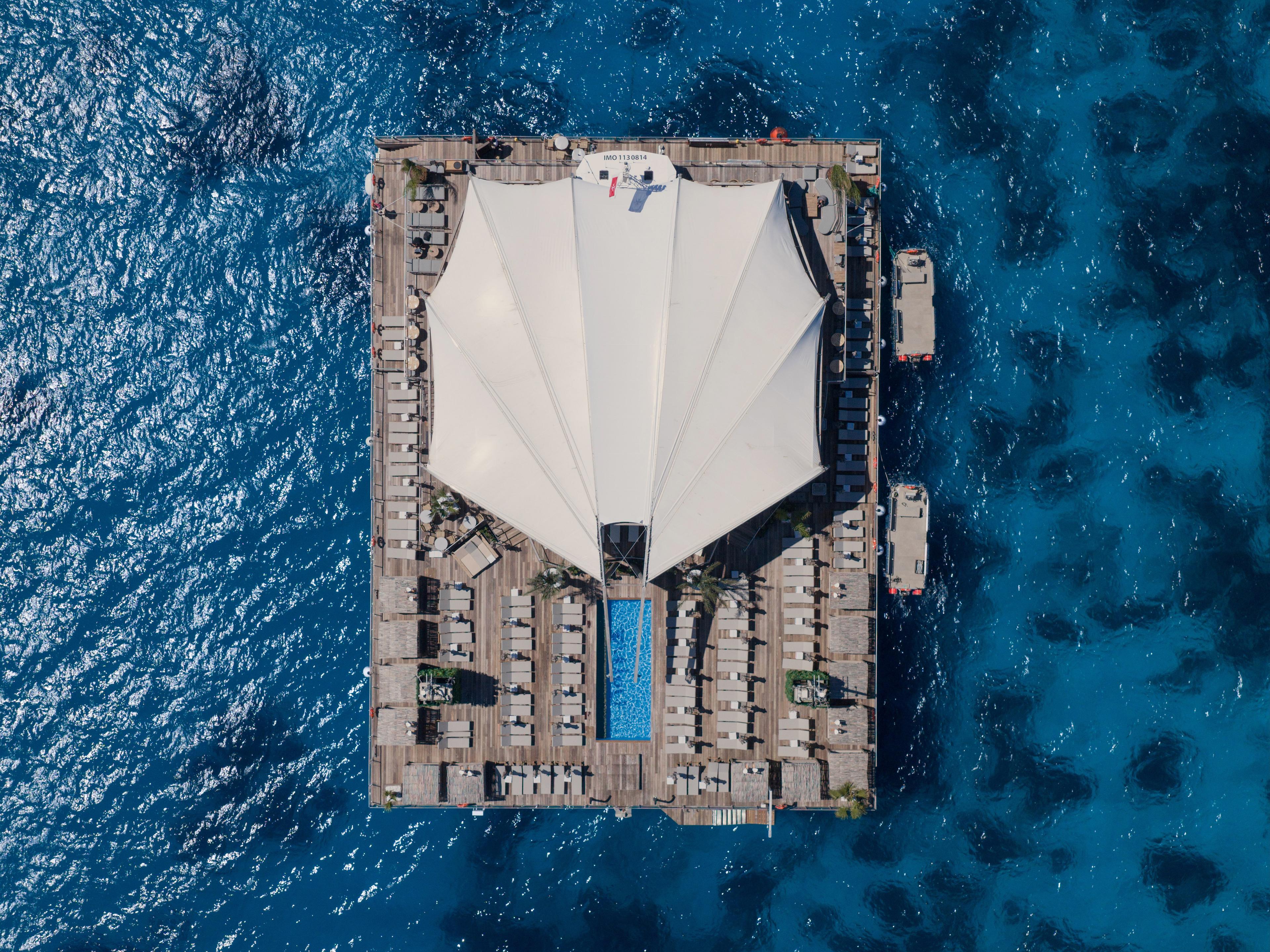 NOMA Island Floating Beach Club Experience with Optional Land Private Transfers - cover photo